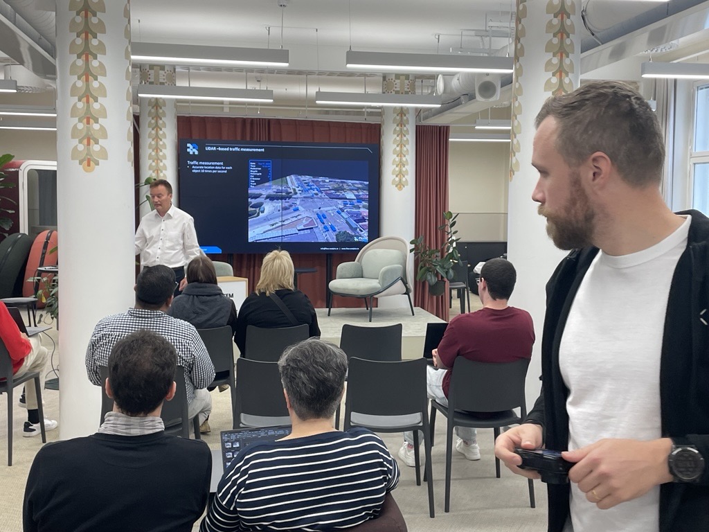 People in attendance following a pitch from a startup at Mall of Tripla Challenge